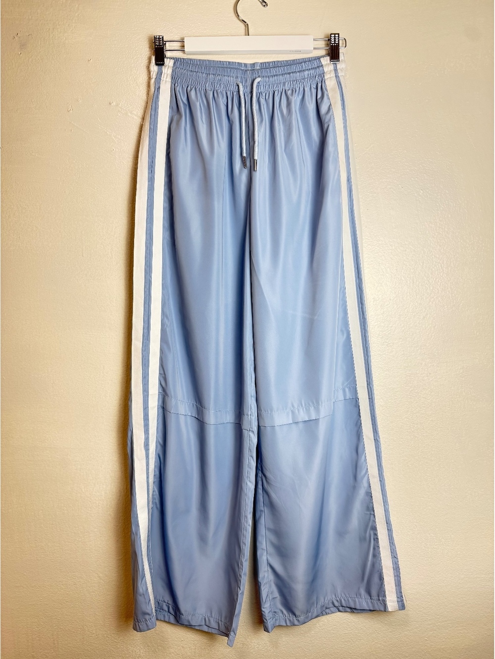 Light Blue Track Pants with White Side Stripes and Drawstring Waist